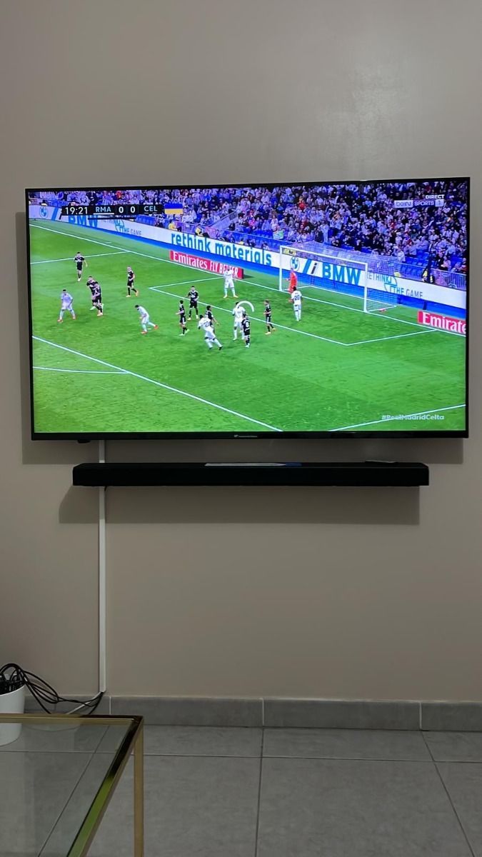 Luisa B customer review photo showing living room TV setup